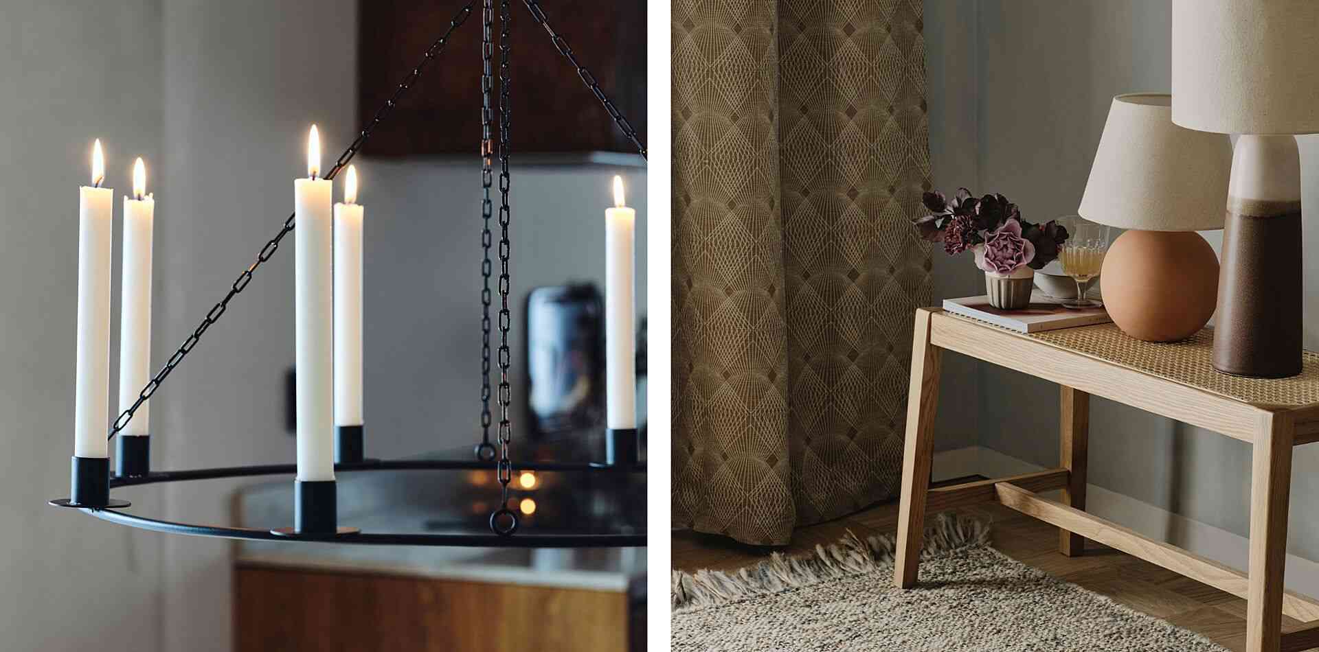 Ljuskrona med tända vita ljus bredvid ett bord med dekorativa föremål inklusive lampor, blommor och böcker