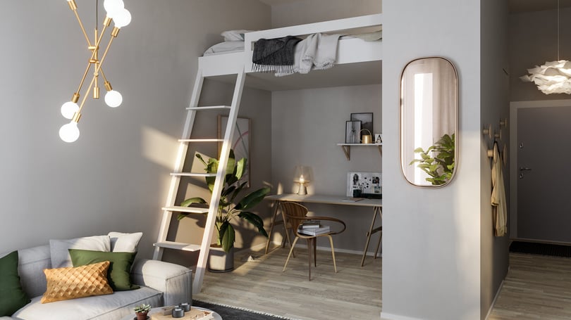 Inredd lägenhet med loftsäng, arbetsplats och soffa i vardagsrum